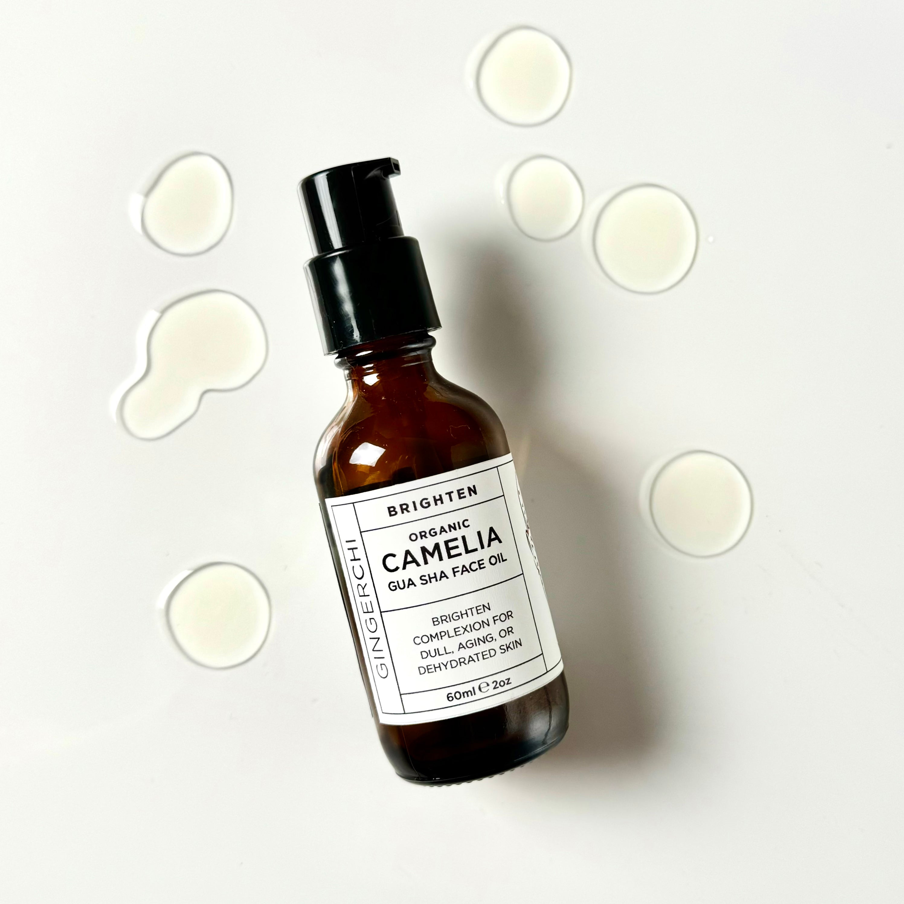 Organic Camellia Gua Sha Facial Oil bottle with white label