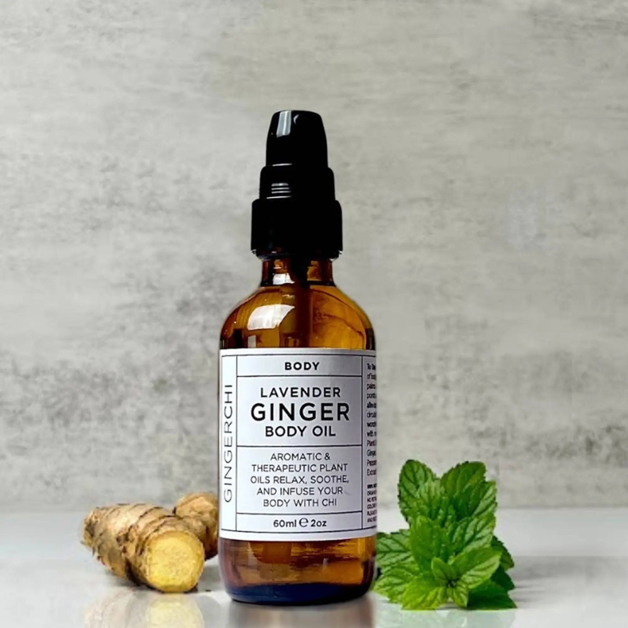 Lavender Ginger Body Oil by GingerChi in glass bottle with botanical-infused nourishing oils