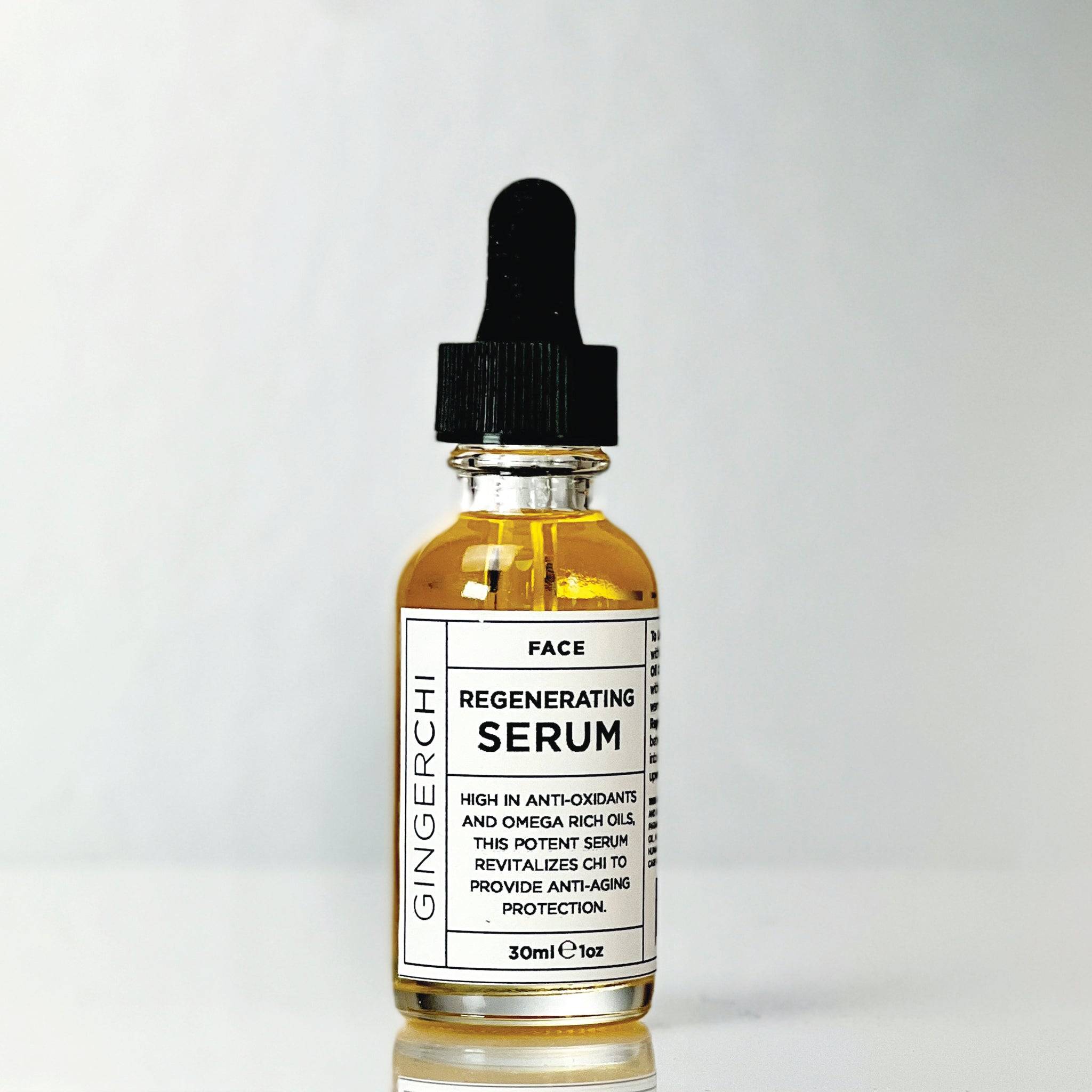 A clear glass bottle with a dropper containing yellow-colored liquid, labeled as 'Regenerating Serum' for facial use.